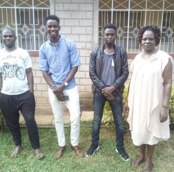 Daniel Odhiambo (second from left) with his family