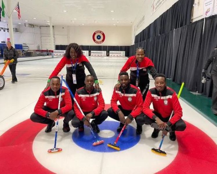 Daniel Odhiambo with his curling team at the Kenya Curling Federation