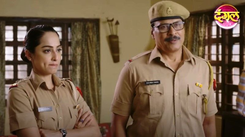 Dinesh Phadnis (right) in a still from the TV series 'CIF'