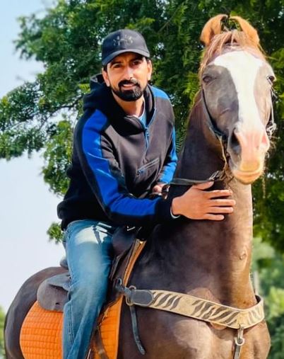 Gursewak Mander riding a horse