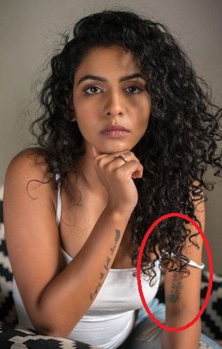 Himika Bose's tattoo on her left bicep