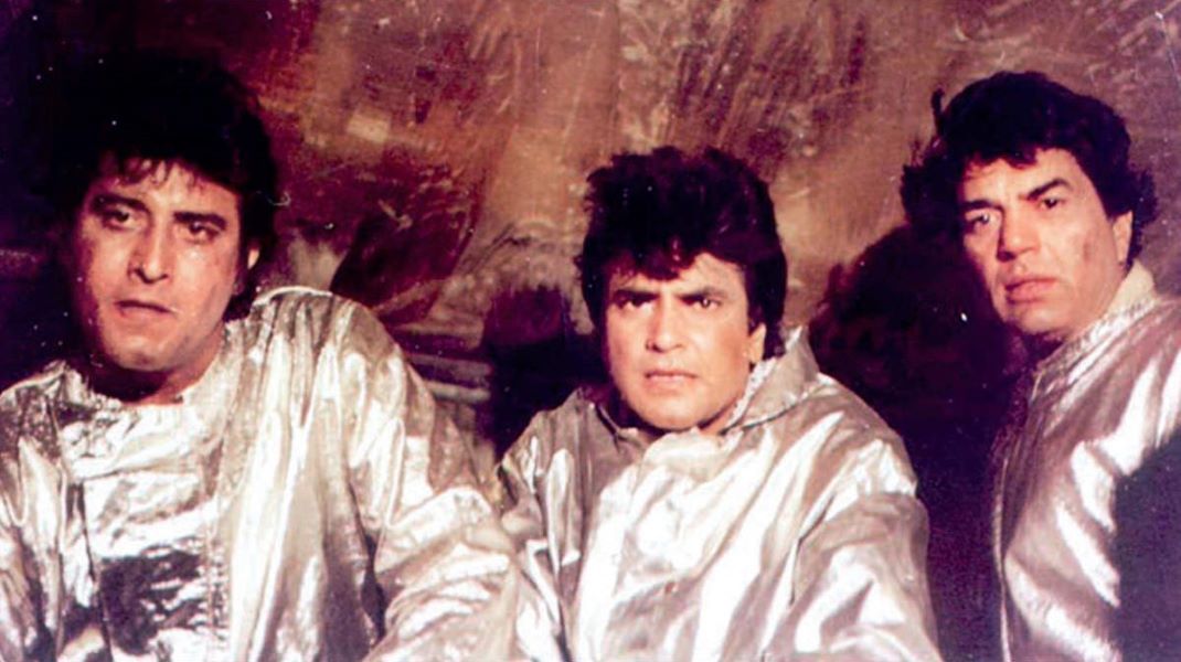 Jeetendra, Dharmendra and Vinod Khanna in a still from The Burning Train