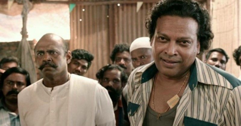 John Vijay (right) in a still from the film 'Sarpatta Parambarai'