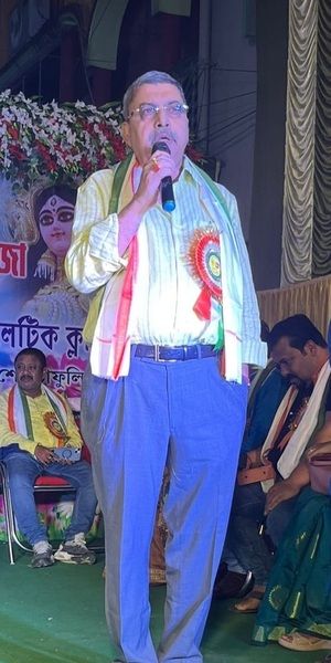 Kalyan Banerjee giving a speech