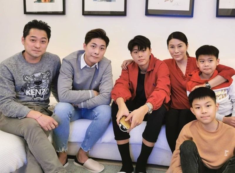 Lai Suk-yin with Angus Hui and her four sons