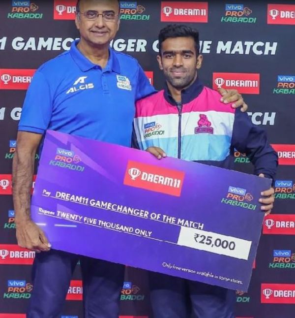 Lucky Sharma receiving the Game Changer of the Match title