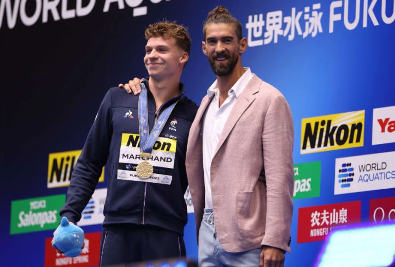 Michael Phelps presented Marchand with the gold medal at the 2023 World Aquatics Championships held in Fukuoka, Japan