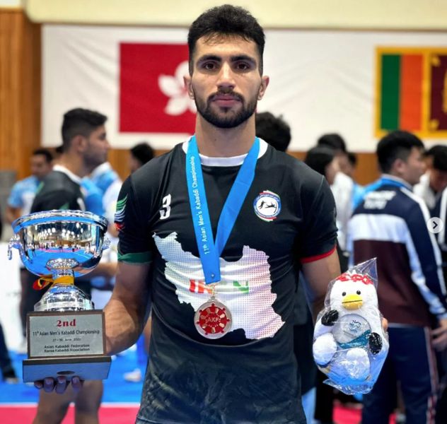 Milad Jabbari after winning the silver medal of the 2022 Asian Games