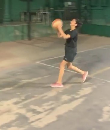 Mrinmayee Godbole while playing basketball