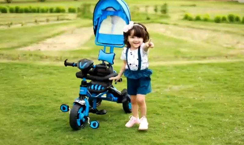 Myreen Grover in her first digital advertisement for Funride and Dash Toys's Micro 3 in 1 Tricycle in 2022