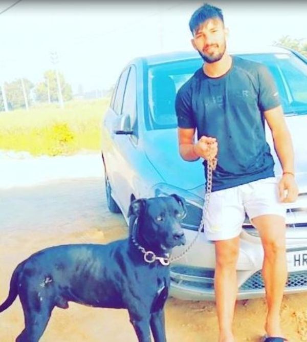 Naveen Sharma with his dog