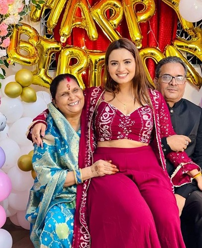Neelam Giri with her parents