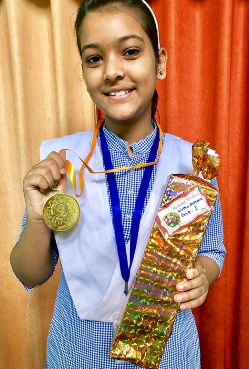 Nishtha Sharma after securing first position in school