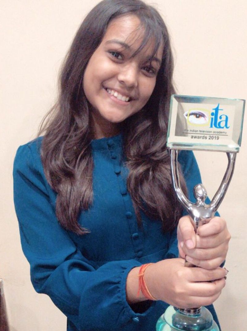 Nishtha Sharma posing with ITA Award