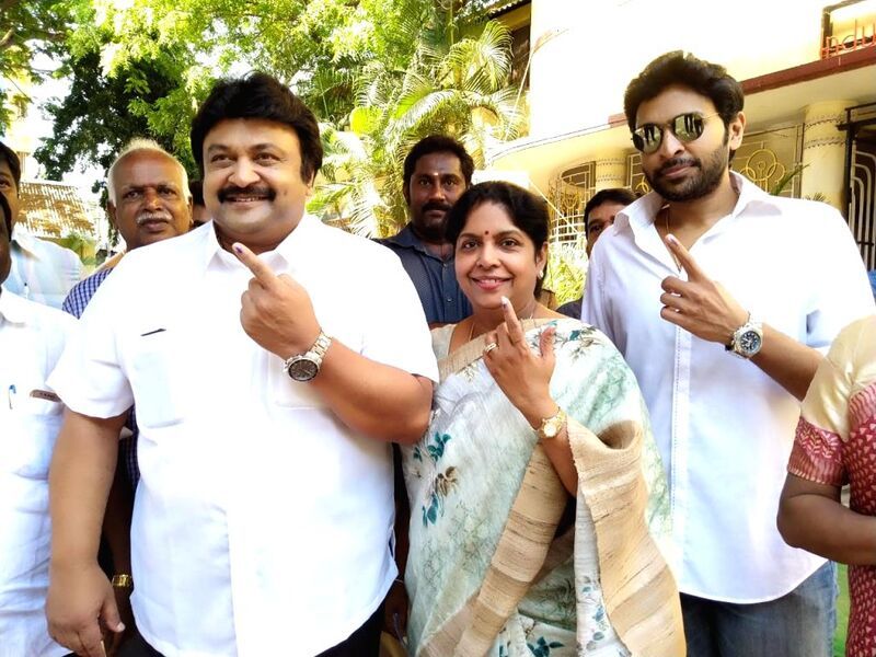 Prabhu, Punitha, and Vikram (left to right) after casting vote