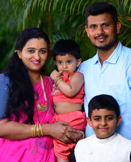 Prashanth Rai with his wife and children
