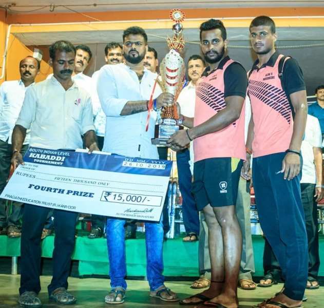 Rakshith S (second from right) after winning the 3rd runner-up position at the South India Level Men's Day-Night Mat Kabaddi Tournament 2019