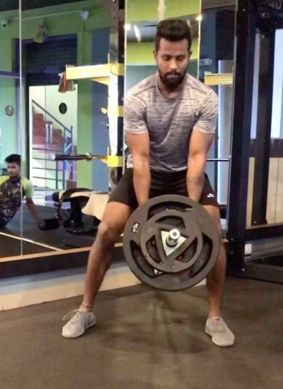 Rakshith S while working out in a gym