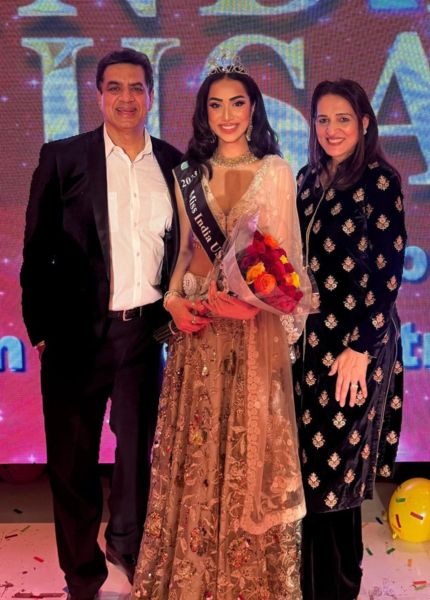 Rijul Maini (centre) with her parents after winning the Miss India USA 2023 title