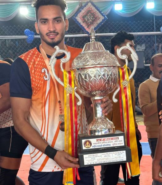 Robin Chaudhary holding the first position trophy of All India Kabaddi Championship (2022)