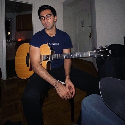 Rohan Gurbaxani playing guitar