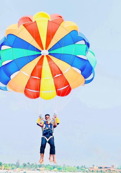 Sachin Prathap parasailing on one of his vacations