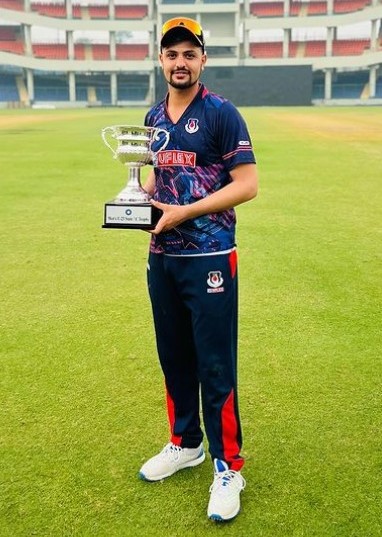 Sameer Rizvi with the trophy after winning the 2023 Men’s Under-23 State A tournament