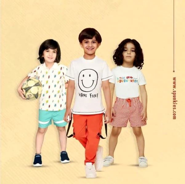 Sanvir Sachdeva featured in a print advertisement for Spunkies Kids Fashion Store (leftmost)