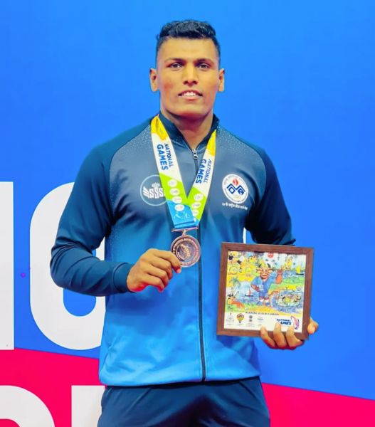 Shankar Gadai with his bronze medal at the 37th National Games in 2023