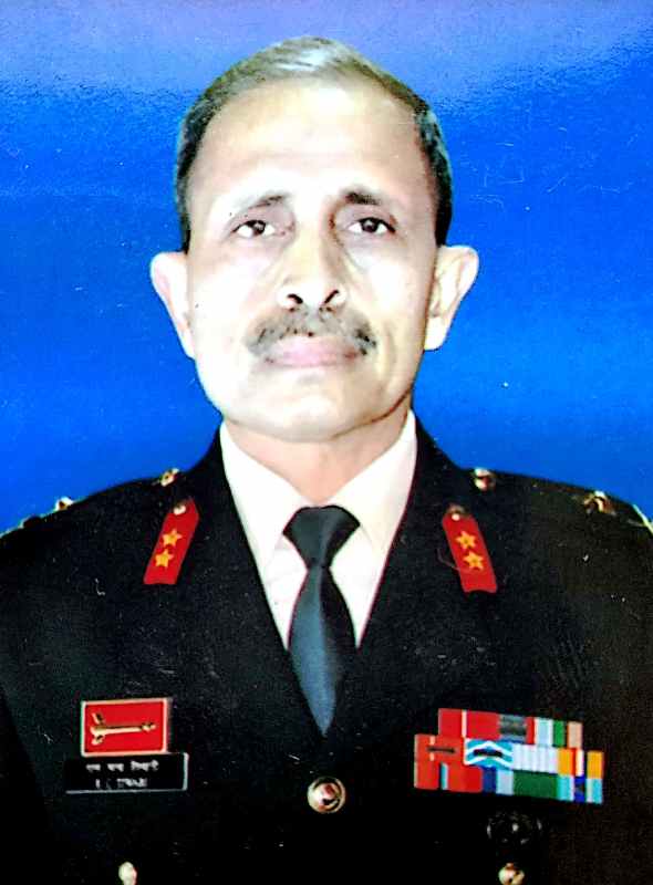 The ATGM firer badge (above the nameplate) worn by R. C. Tiwari on his uniform