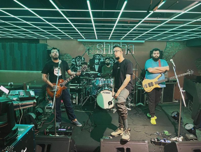 The Underground Authority rock band; (clockwise from front) EPR, Adil Rashid, Sourish Kumar, and Soumyadeep Bhattacharya