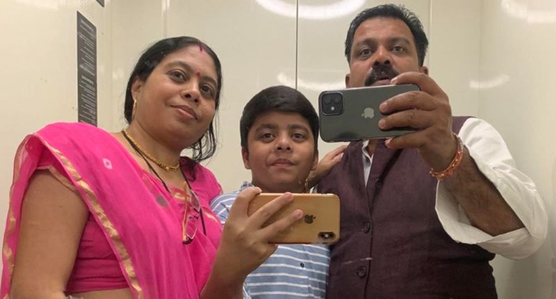 Vijay Sharma with his wife and son