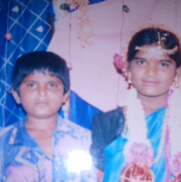 A childhood picture of Santhosh Kumar with his sister