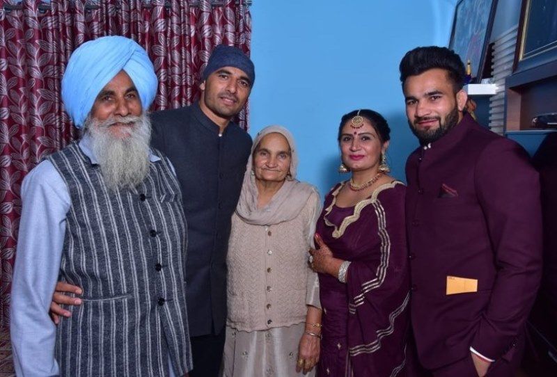 A family photograph of Ran Singh (extreme right)