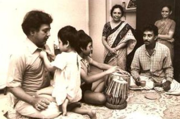 A young Rashid Khan with his family