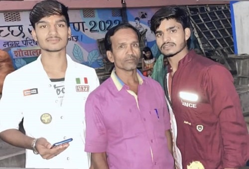 Aashish Yadav with his father and brother