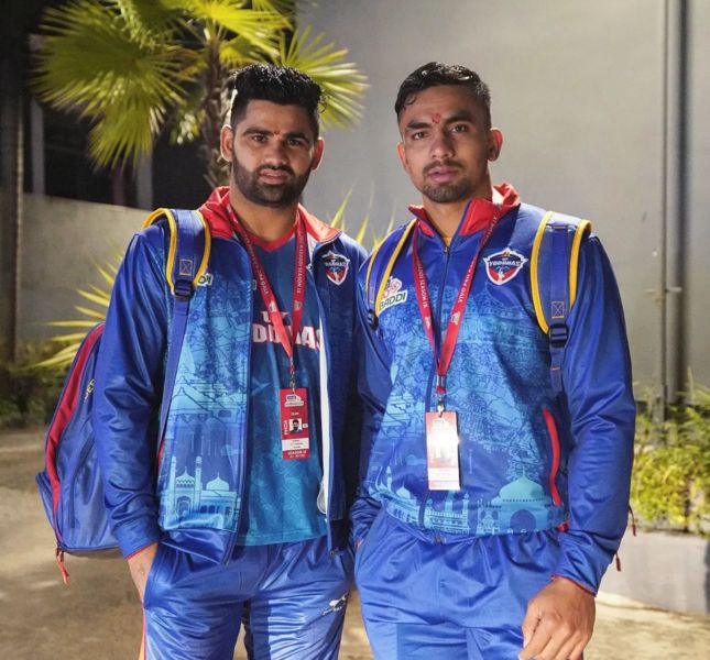 Ashu Singh with Pardeep Narwal (right)