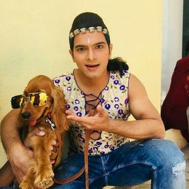 Basant Bhatt with a dog