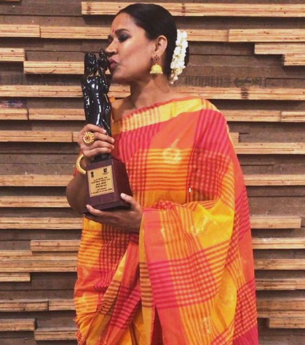 Chhaya Kadam with the Best Supporting Actress award, which she won at the at the 56th Maharashtra State Marathi Film Awards