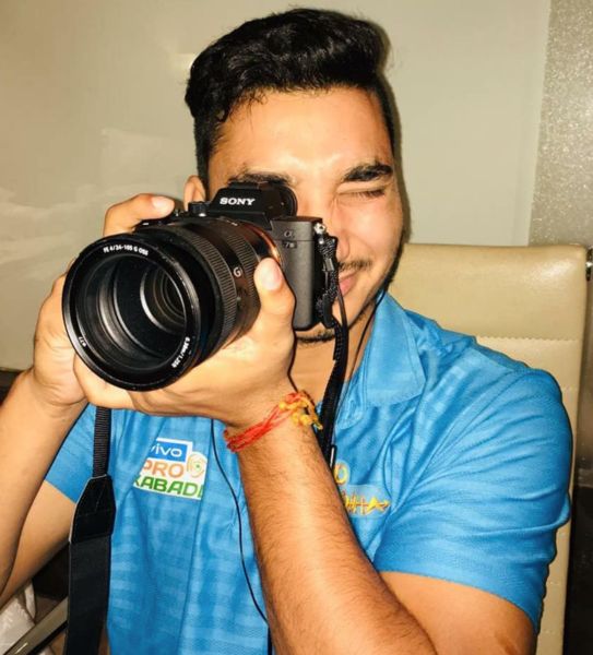Gulveer Singh clicking pictures with his camera