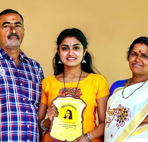Haritha G. Nair and her parents