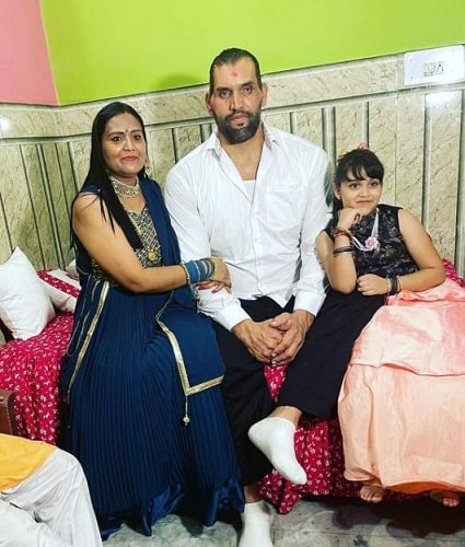 Harminder Kaur with her husband and daughter