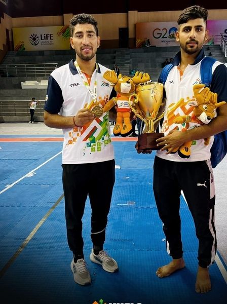 Himanshu Narwal (right) with Himanshu Yadav (left) after winning the 2022 Khelo India University Games