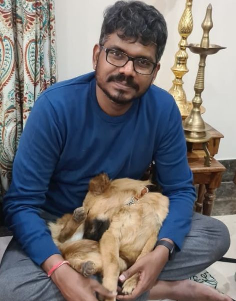 J. Sai Deepak with one of his three pet dogs, Laya