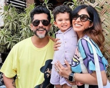 Kishwer Merchant with husband and son