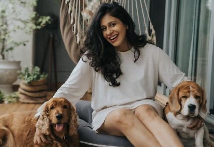 Kishwer with her pet dogs