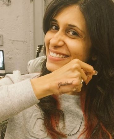 Kishwer with the gratitude tattoo
