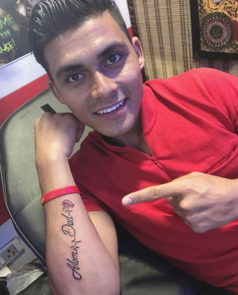 Krishan Bahadur Pathak'a right arm tattoo