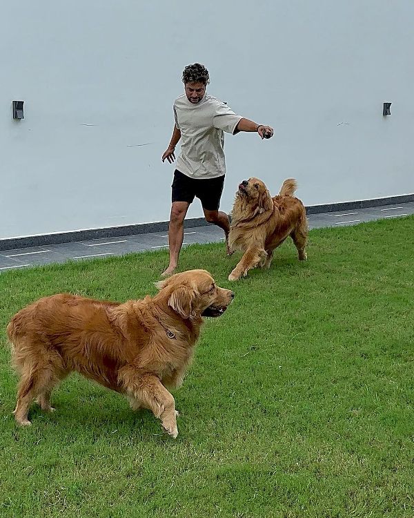 Kuldeep Yadav playing with his pet dogs