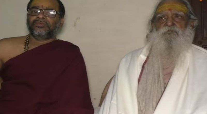 Laxmikant Mathuranath Dixit (right) with his son